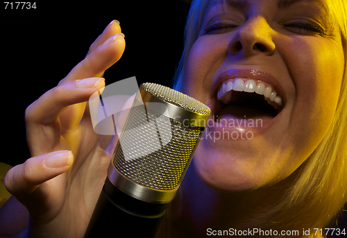 Image of Woman Sings with Passion