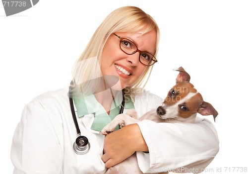 Image of Attractive Female Doctor Veterinarian with Small Puppy