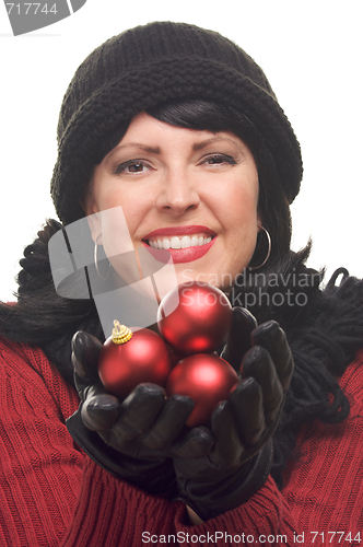 Image of Attractive Woman Holding Red Ornaments
