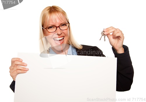 Image of Attractive Blonde Holding Keys and Blank White Sign