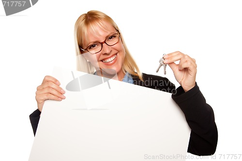 Image of Attractive Blonde Holding Keys and Blank White Sign