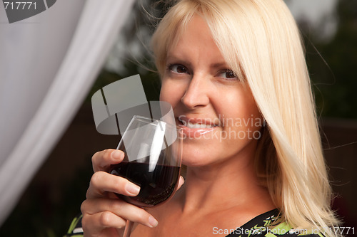 Image of Beautiful Blonde Enjoying Wine