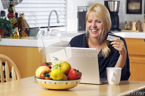 Image of Woman Using Laptop for E-commerce