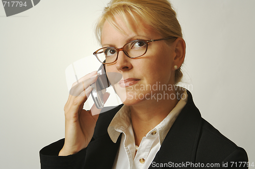 Image of Businesswoman Using Cell Phone