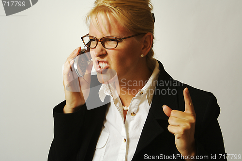 Image of Angry Business Woman on Cell Phone