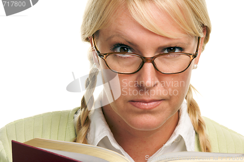 Image of Serious Female with Ponytails and Book