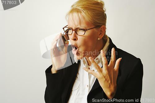 Image of Angry Business Woman on Cell Phone