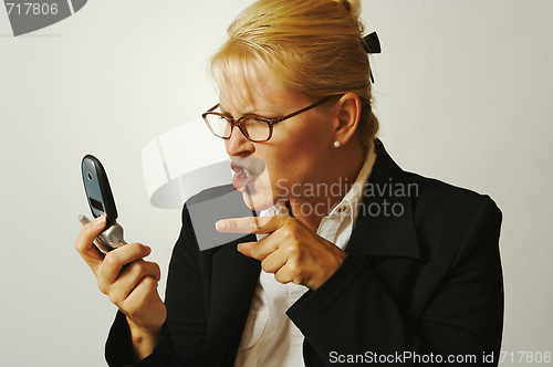 Image of Angry Business Woman on Cell Phone