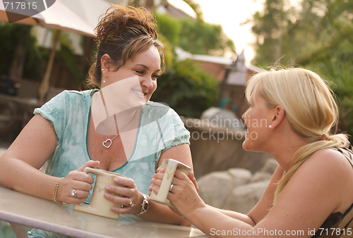 Image of Girlfriends Enjoy A Conversation