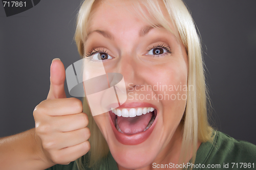 Image of Beautiful Woman with a Thumbs Up