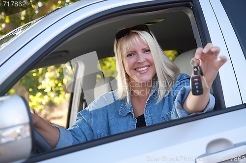 Image of Attractive Woman In New Car with Keys