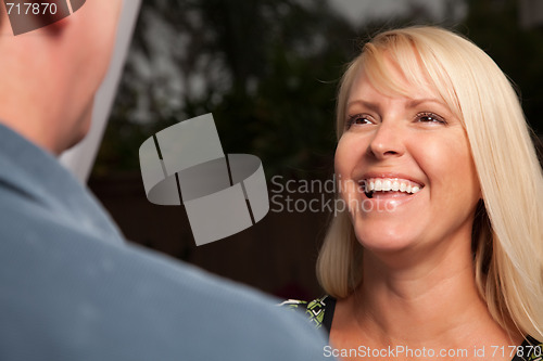 Image of Blonde Socializing with Wine Glass