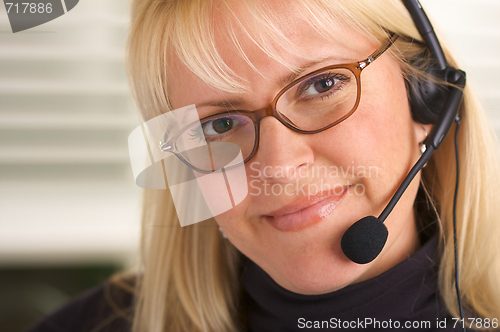 Image of Attractive Businesswoman with Phone Headset