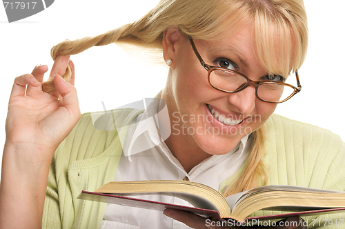 Image of Female With Ponytails Reads Her Book