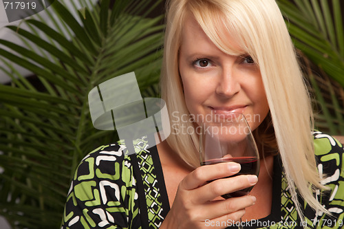 Image of Beautiful Blonde Enjoying Wine