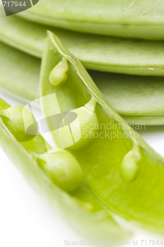 Image of fresh peas on white background