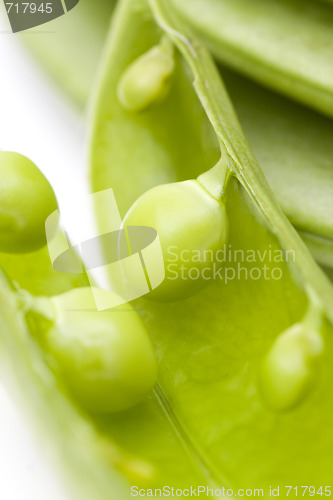 Image of fresh peas on white background