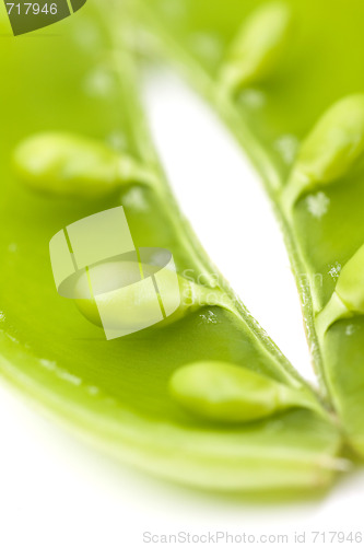 Image of fresh peas on white background