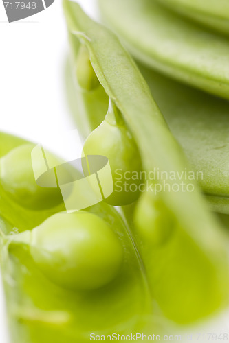 Image of fresh peas on white background