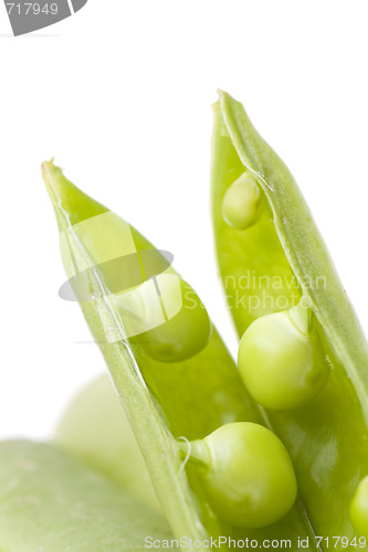 Image of fresh peas on white background