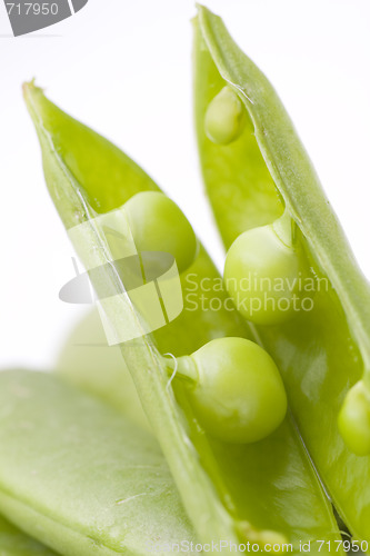 Image of fresh peas on white background