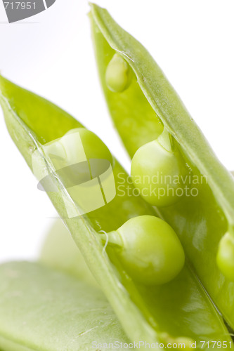 Image of fresh peas on white background