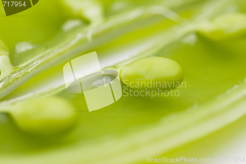 Image of fresh peas on white background