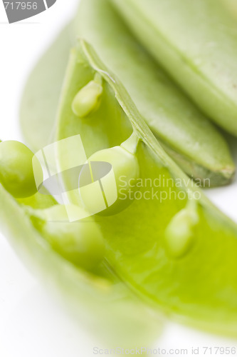 Image of fresh peas on white background