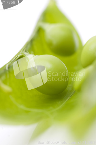 Image of fresh peas on white background