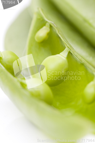 Image of fresh peas on white background