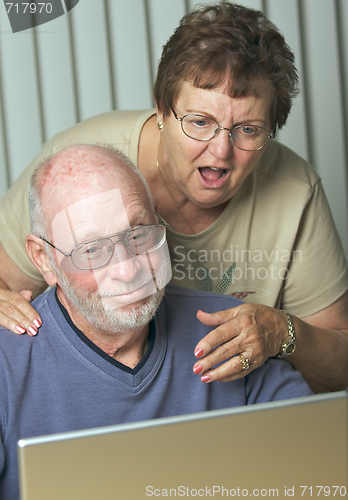 Image of Senior Adults on Laptop Computer