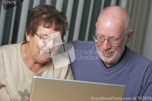 Image of Senior Adults on Laptop Computer