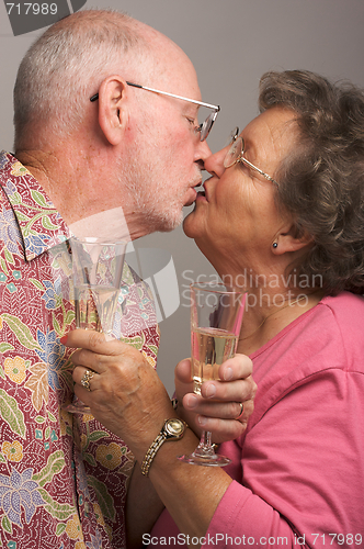 Image of Happy Senior Couple Kissing