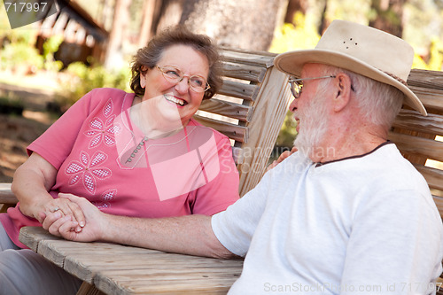 Image of Loving Senior Couple Outdoors