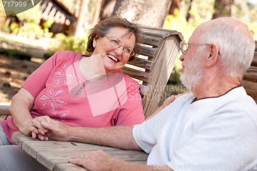 Image of Loving Senior Couple Outdoors