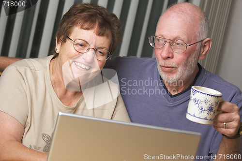 Image of Senior Adults on Laptop Computer