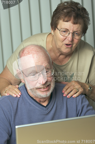 Image of Senior Adults on Laptop Computer