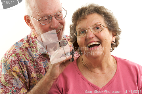 Image of Senior Couple and Cell Phone