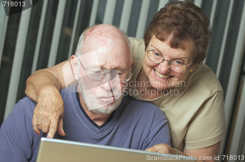 Image of Senior Adults on Laptop Computer