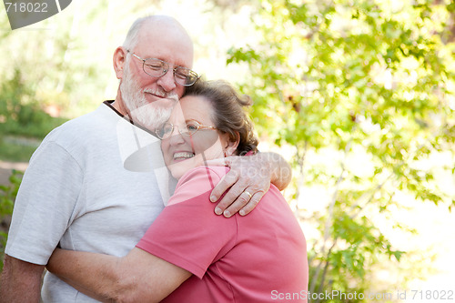 Image of Loving Senior Couple Outdoors