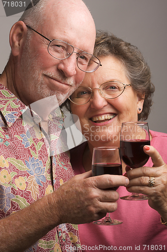 Image of Happy Senior Couple Toasting