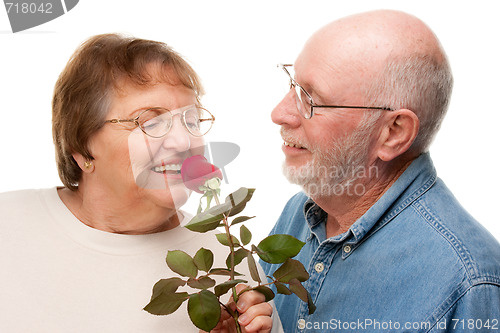 Image of Happy Senior Couple with Red Rose