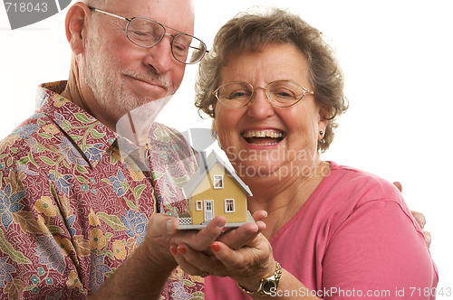 Image of Happy Senior Couple & Home