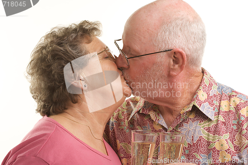 Image of Happy Senior Couple Kissing