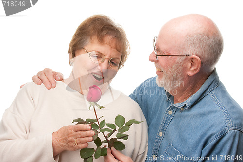 Image of Happy Senior Couple with Red Rose