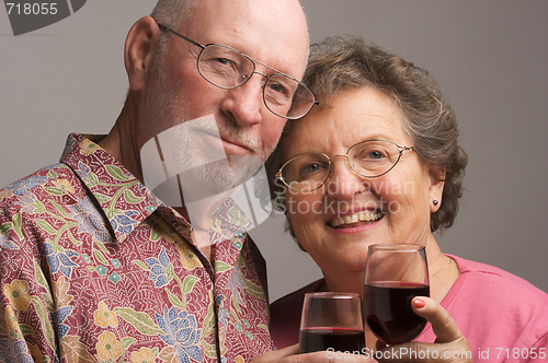 Image of Happy Senior Couple Toasting