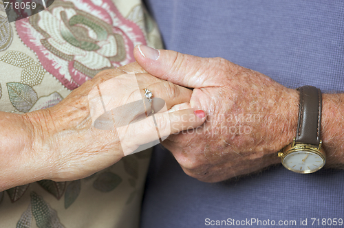 Image of Senior Adult Couple Holding Hands