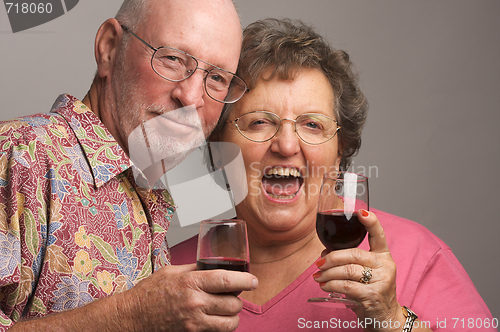 Image of Happy Senior Couple Toasting