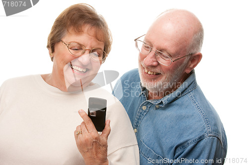 Image of Happy Senior Couple Using Cell Phone