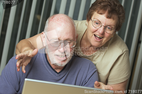 Image of Senior Adults on Laptop Computer